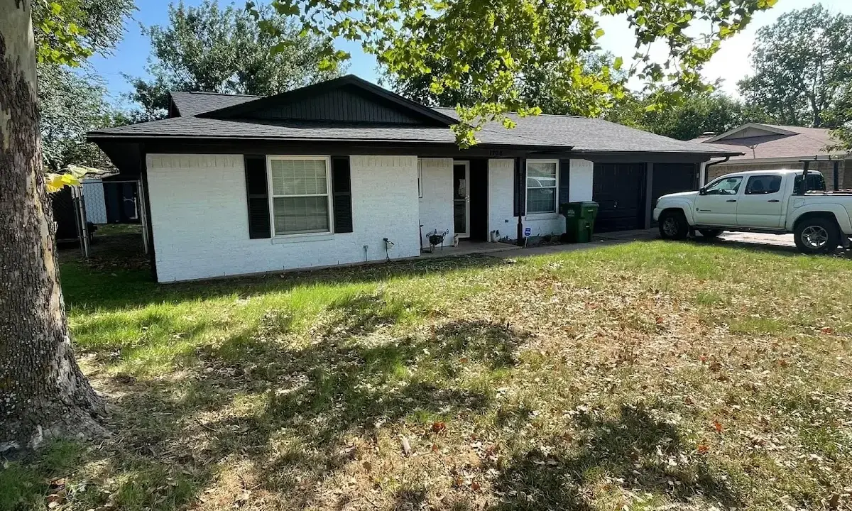 Professional roofing crew working on a residential roof in Murrysville